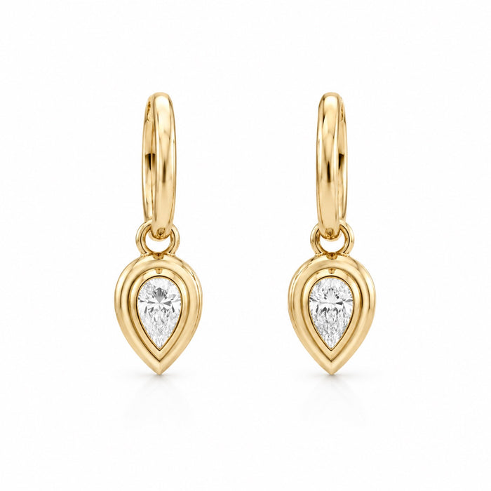 Yellow gold huggie earrings with diamond pear drops