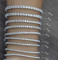 9 tennis bracelets in various sizes