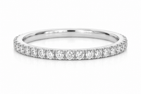 Silver ring with small diamonds on a white background