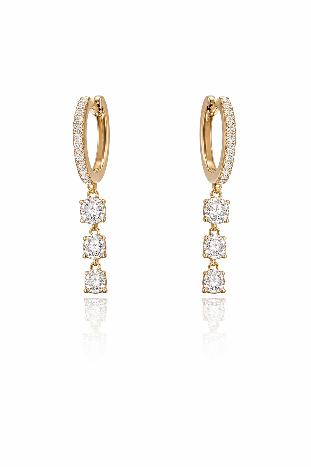 Gold hoop earrings with diamond drops on a white background