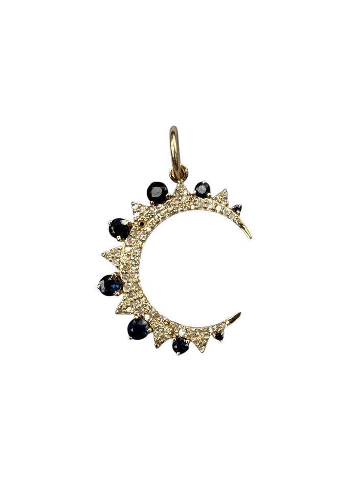 Gold moon-shaped pendant with black gemstones on a white background