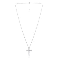 White gold cross necklace with diamonds on a white background