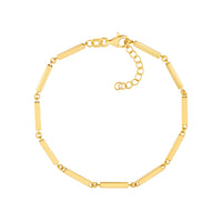 Gold bracelet with rectangular links on a white background