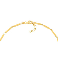 Gold bracelet on a white background