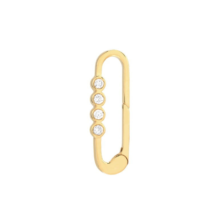 Gold earring with three clear gemstones on a white background