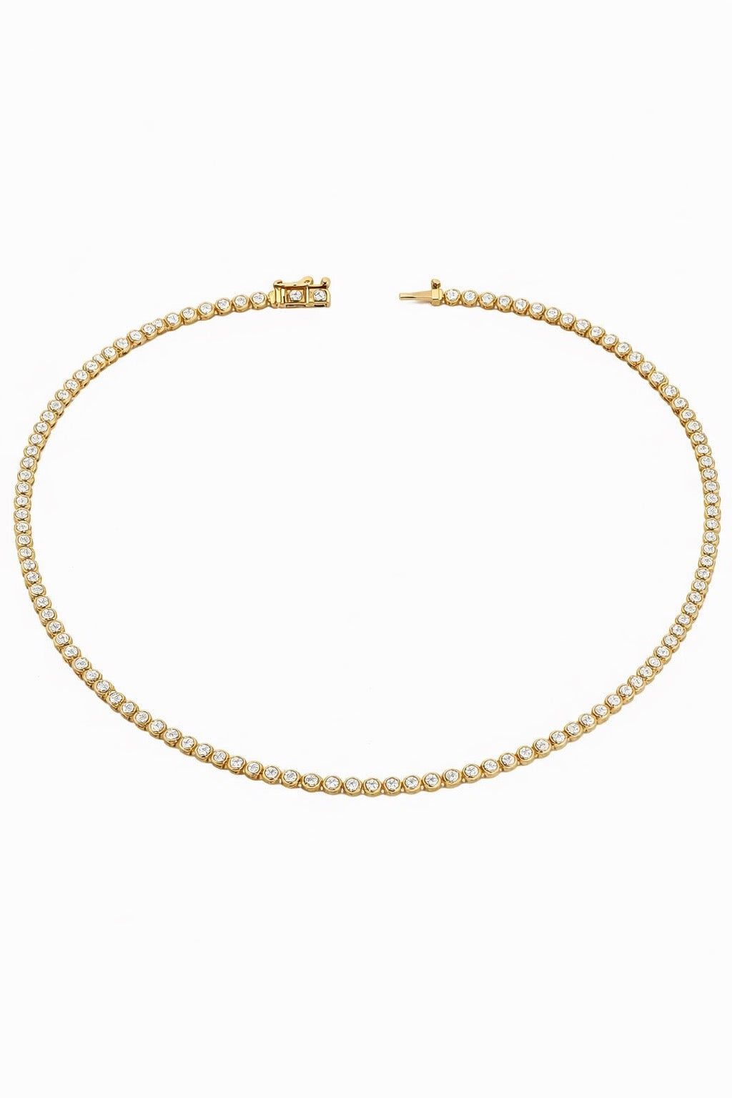 Gold necklace with diamonds on a white background