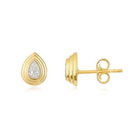 side view of bezel set pear cut diamond earrings