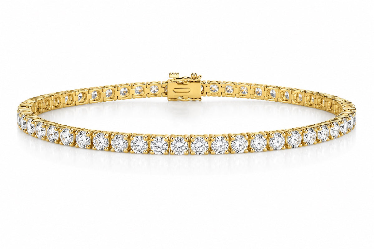 Gold bracelet with diamonds on a white background