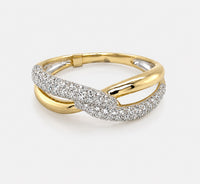 A gold twist ring featuring a pavé-set silver band with pave diamonds, shown on a light gray background.
