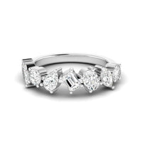 small white gold ring with different shaped diamonds