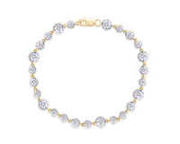 Gold and diamond bracelet on a white background