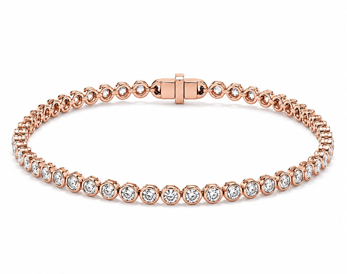 A rose gold tennis bracelet featuring round diamond in a classic bezel set design, displayed on a clean white background.