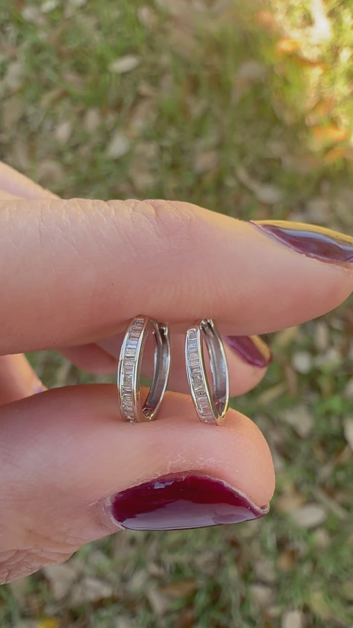 Pair of white gold and baguette diamond hoop earrings video