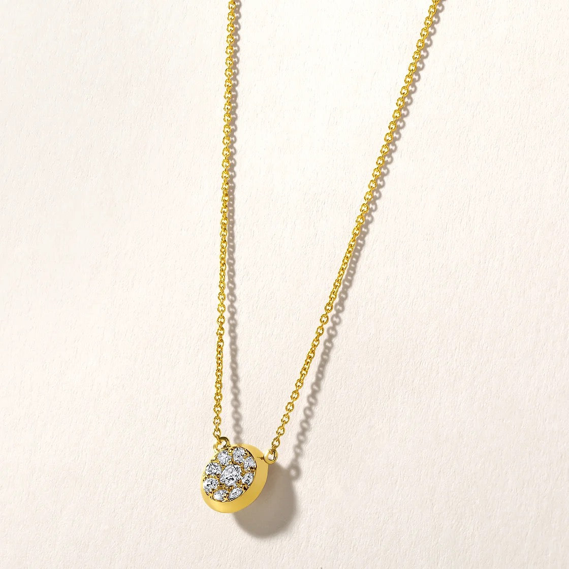 The Karat Concierge 14K yellow gold crushed diamond pendant necklace with 0.26 carat natural diamonds.