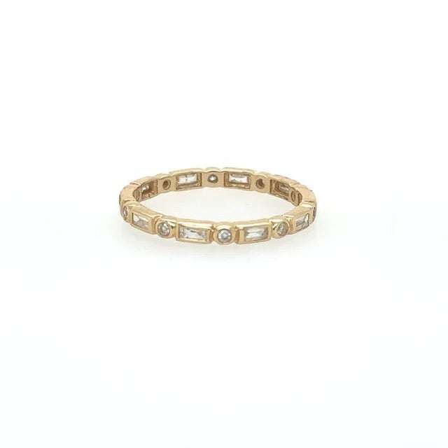 The Karat Concierge 14KT yellow gold eternity band with bezel-set baguette and round diamonds.