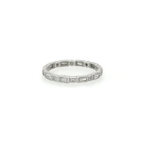 The Karat Concierge 14KT gold eternity band with bezel-set baguette and round diamonds on a white background