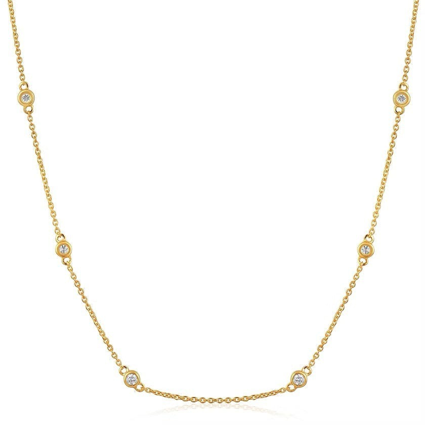 The Karat Concierge diamonds by the yard necklace in 14K yellow gold with bezel set natural diamonds on a delicate chain