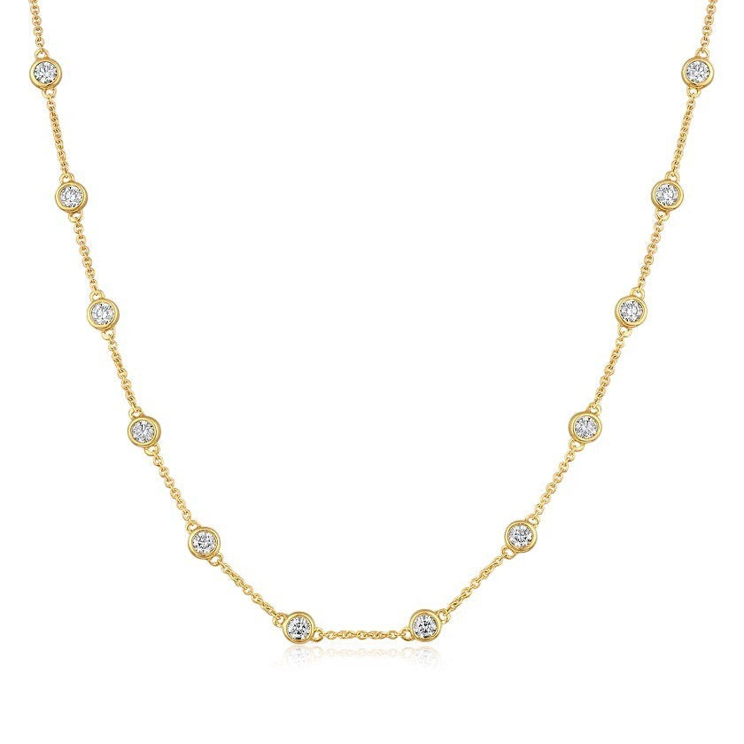 The Karat Concierge diamonds by the yard necklace featuring bezel set round diamonds in 14K yellow gold chain