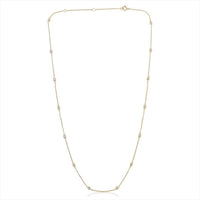 The Karat Concierge diamonds by the yard necklace in 14K gold with bezel-set natural diamonds on a delicate chain.
