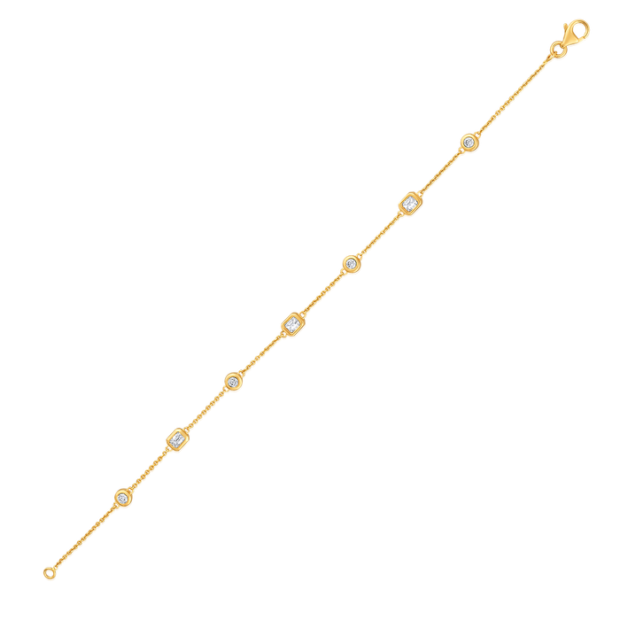 The Karat Concierge Sloane 14K yellow gold bracelet featuring seven bezel-set natural diamonds on a delicate chain.