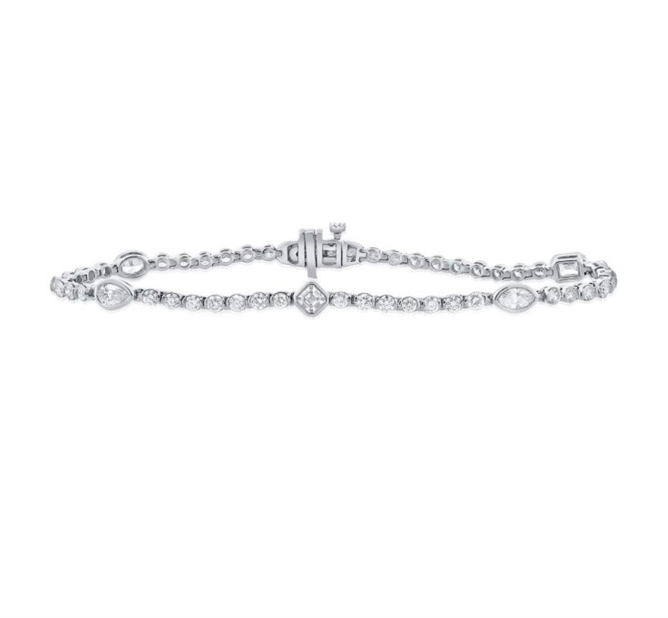 The Karat Concierge Kate bezel set tennis bracelet featuring mixed shape diamonds in white gold
