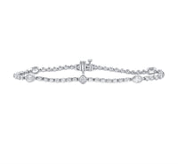 The Karat Concierge Kate bezel set tennis bracelet featuring mixed shape diamonds in white gold