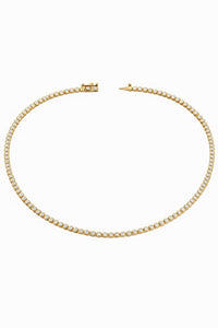 The Karat Concierge 14K yellow gold tennis necklace with bezel set stones in a classic 16-inch length.