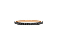 The Karat Concierge black diamond eternity band in 14K yellow gold with black rhodium plating.