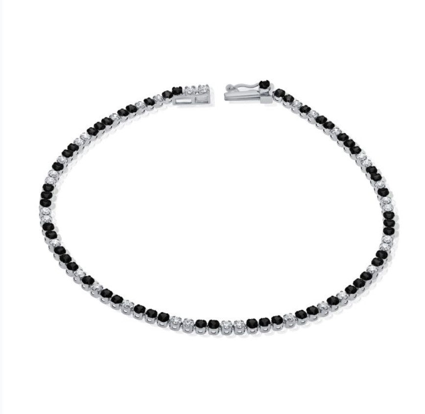 The Karat Concierge black diamond and white diamond tennis bracelet in 14K white gold with a secure clasp