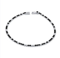 The Karat Concierge black diamond and white diamond tennis bracelet in 14K white gold with a secure clasp