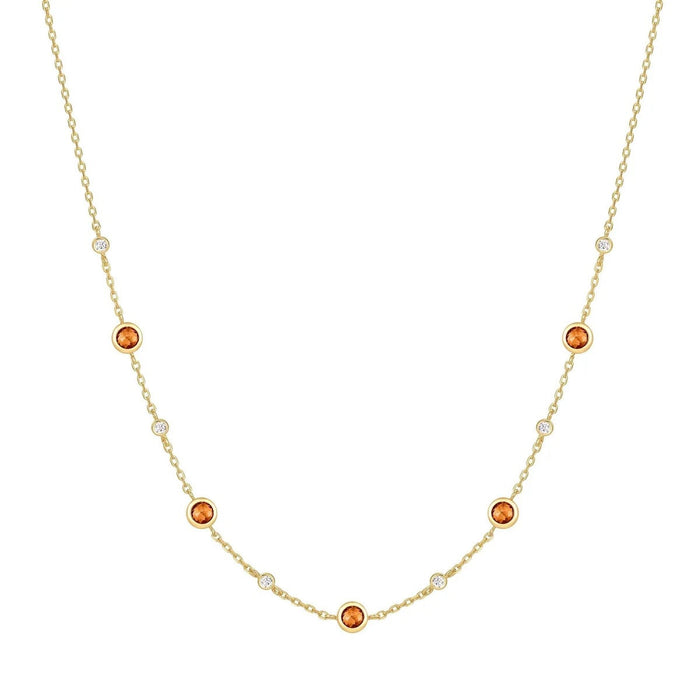 The Karat Concierge 14K gold plated necklace with burnt orange bezel set nano gems and clear cubic zirconia accents.