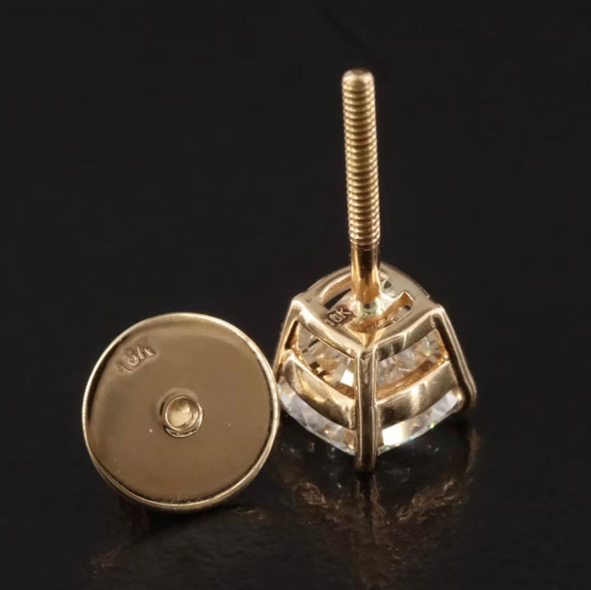 The Karat Concierge cushion cut diamond stud earrings in 18K yellow gold with secure threaded posts and earring backs.