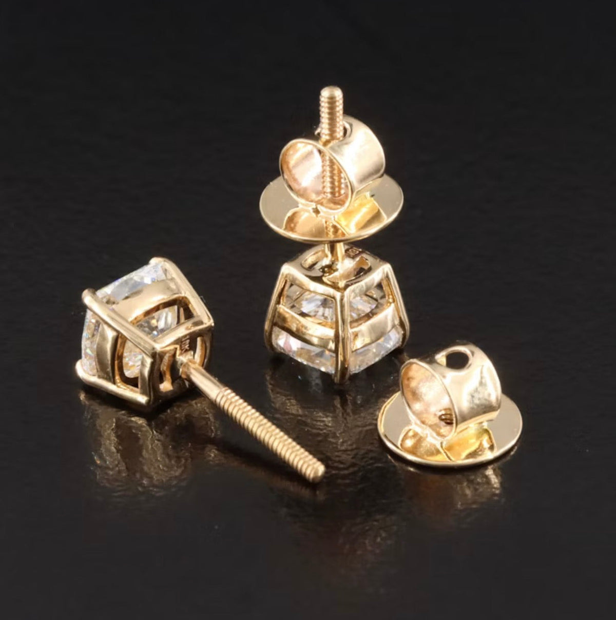 The Karat Concierge 2.08 CTW cushion cut diamond stud earrings in 18K yellow gold with secure threaded posts.