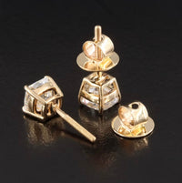 The Karat Concierge 2.08 CTW cushion cut diamond stud earrings in 18K yellow gold with secure threaded posts.