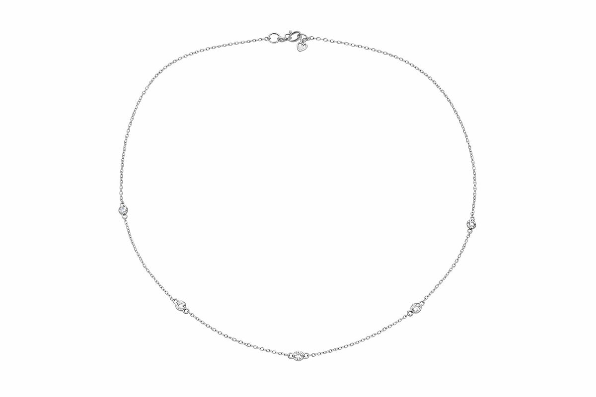 The Karat Concierge diamonds by the yard necklace in 14K white gold with five bezel-set natural diamonds.
