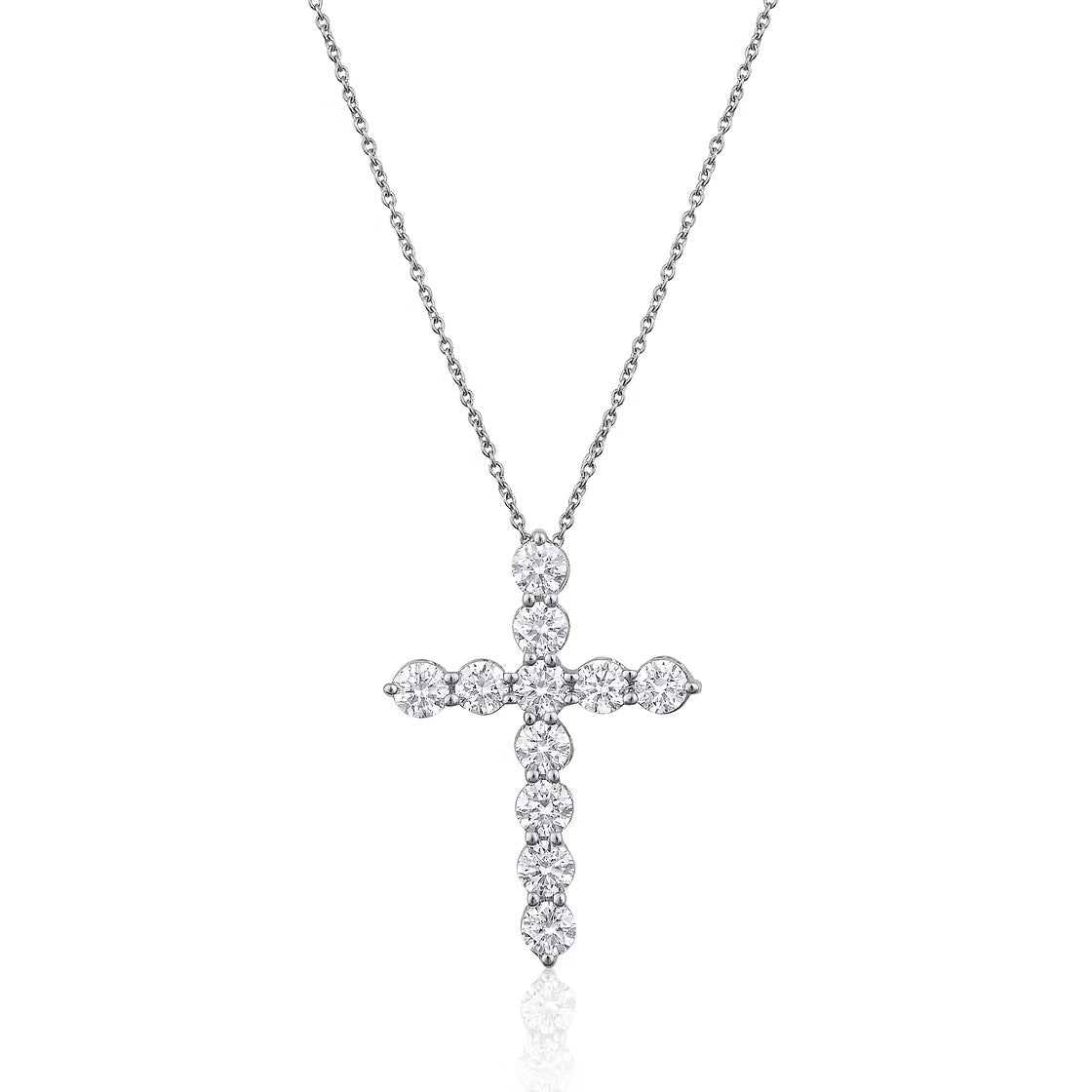 The Karat Concierge 14K white gold cross necklace featuring 11 sparkling round diamonds on a delicate chain.
