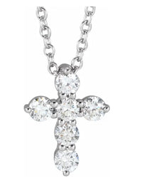 The Karat Concierge diamond cross pendant necklace featuring five brilliant-cut diamonds set in polished silver