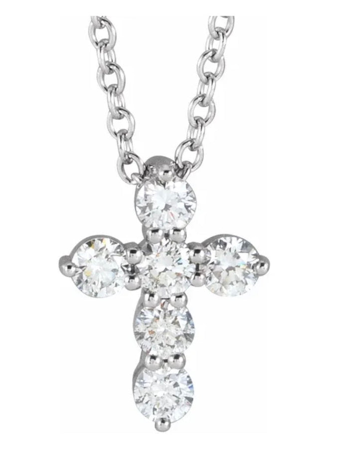 The Karat Concierge diamond cross pendant necklace featuring five brilliant-cut diamonds set in polished silver
