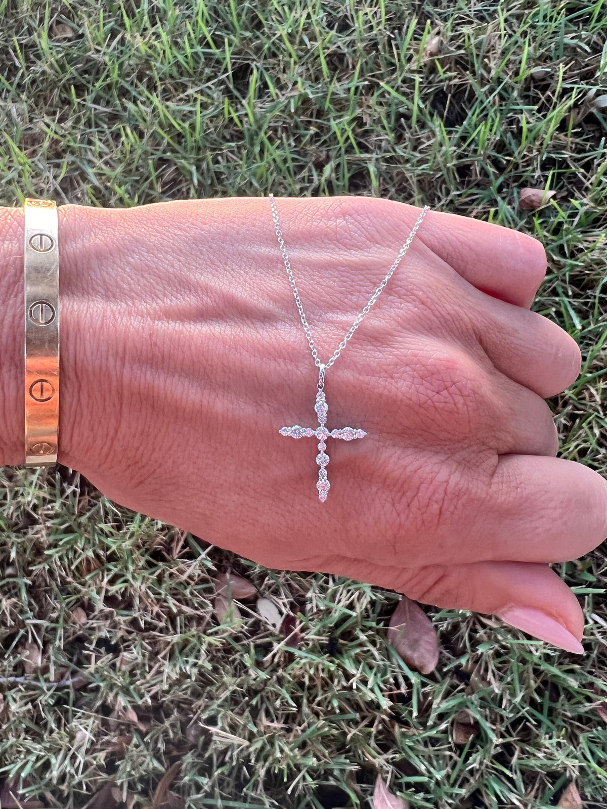 The Karat Concierge 18K white gold diamond cross necklace with .45 CTW round brilliant diamonds on a cable chain.