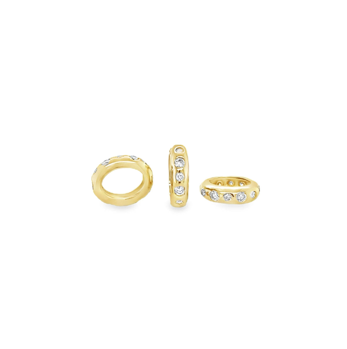 The Karat Concierge 14K yellow gold oval bangle rondelles with sparkling diamond accents in various settings