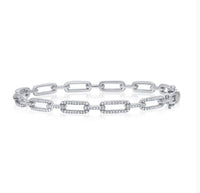 The Karat Concierge diamond link bangle in 14K white gold with .54 CTW natural diamonds and a double latch closure.