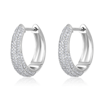 The Karat Concierge 14K white gold huggie earrings featuring a pave setting with 0.48ct natural diamonds.