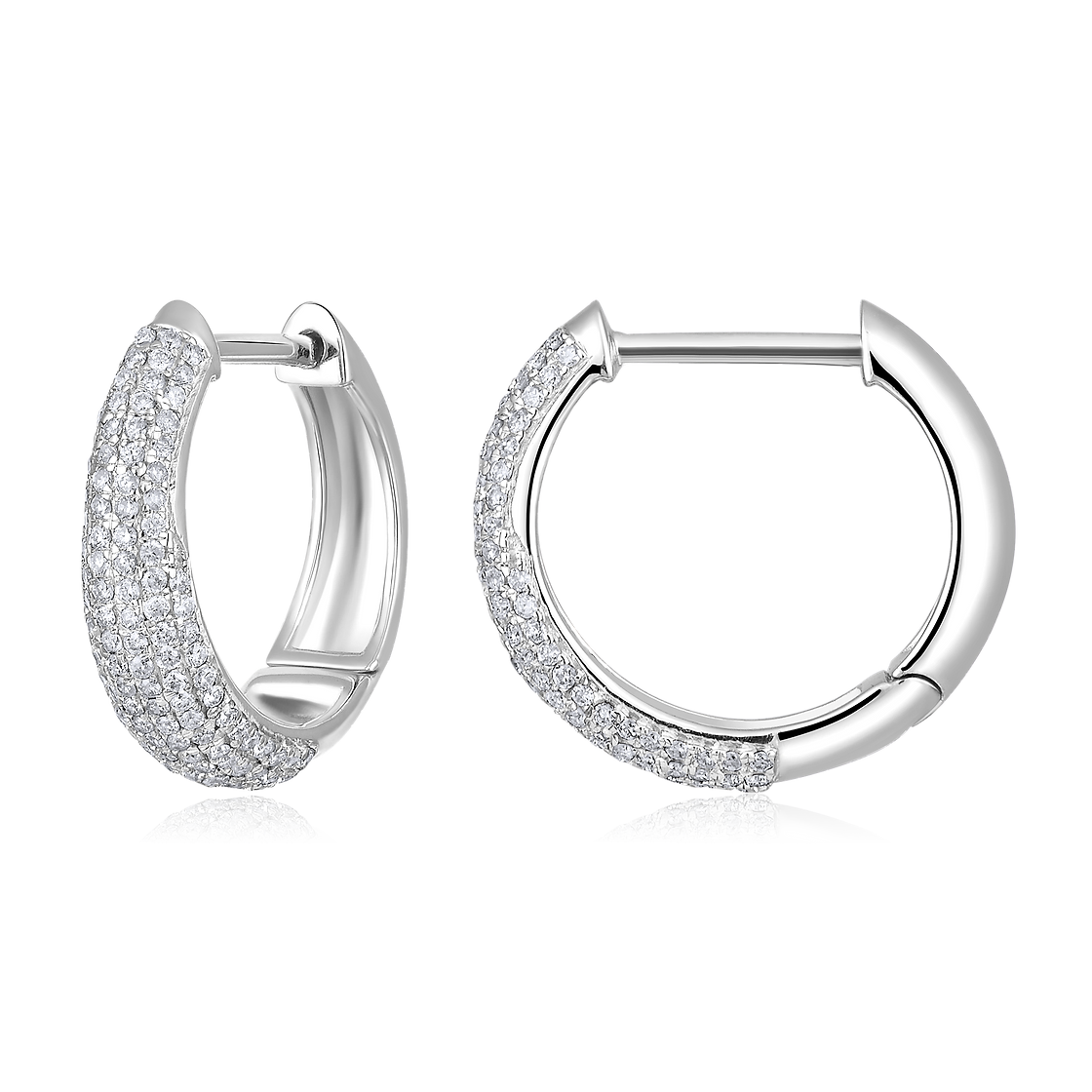 The Karat Concierge 14K white gold huggie earrings featuring pave-set natural diamonds in a polished finish.