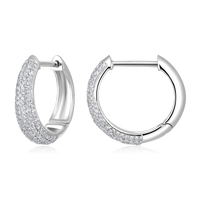 The Karat Concierge 14K white gold huggie earrings featuring pave-set natural diamonds in a polished finish.