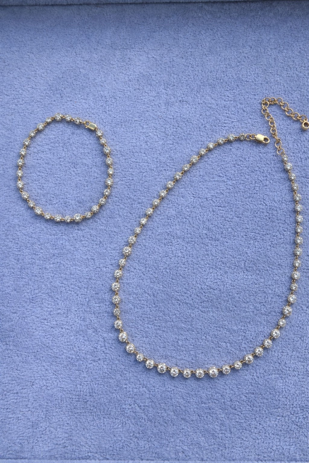 The Karat Concierge 14K yellow gold lab-grown diamond tennis necklace and matching bracelet with 8-prong settings.
