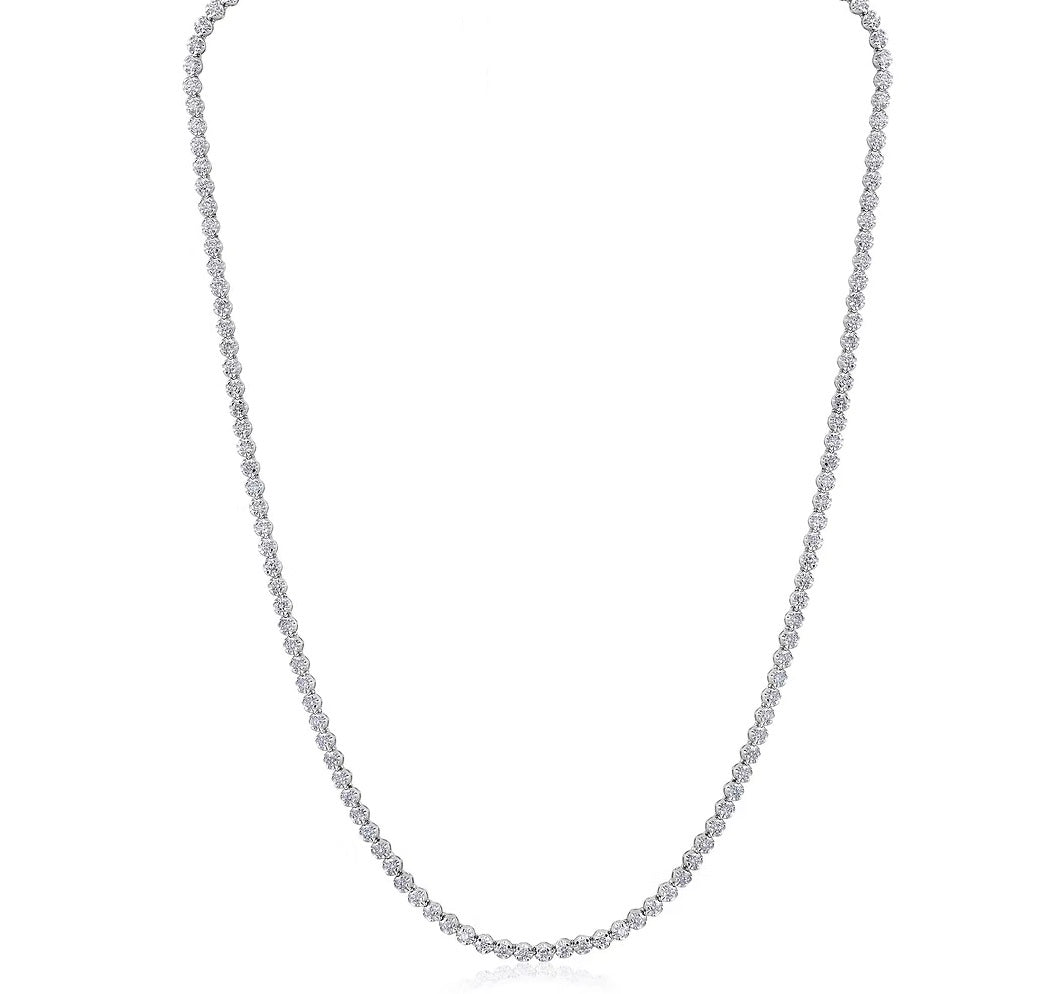 The Karat Concierge 14K white gold tennis necklace featuring 2 CTW crown set diamonds in a 16-inch dainty design.