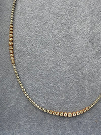 The Karat Concierge Rose Riviera 32-inch tennis necklace featuring 14K white and rose gold with natural diamonds.
