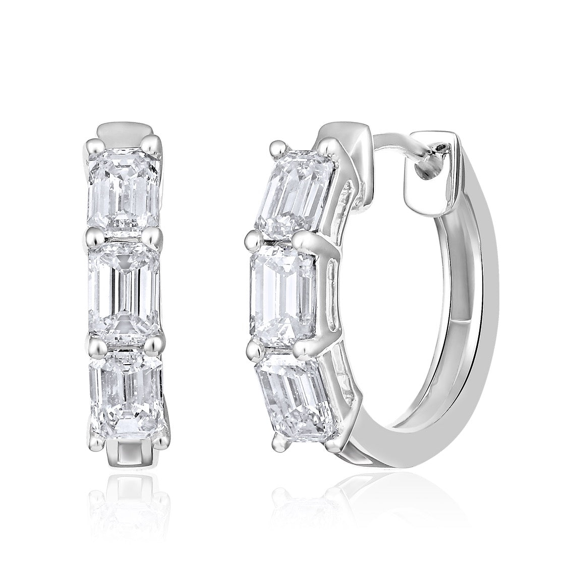 The Karat Concierge 14K white gold huggie earrings featuring three emerald cut natural diamonds per hoop