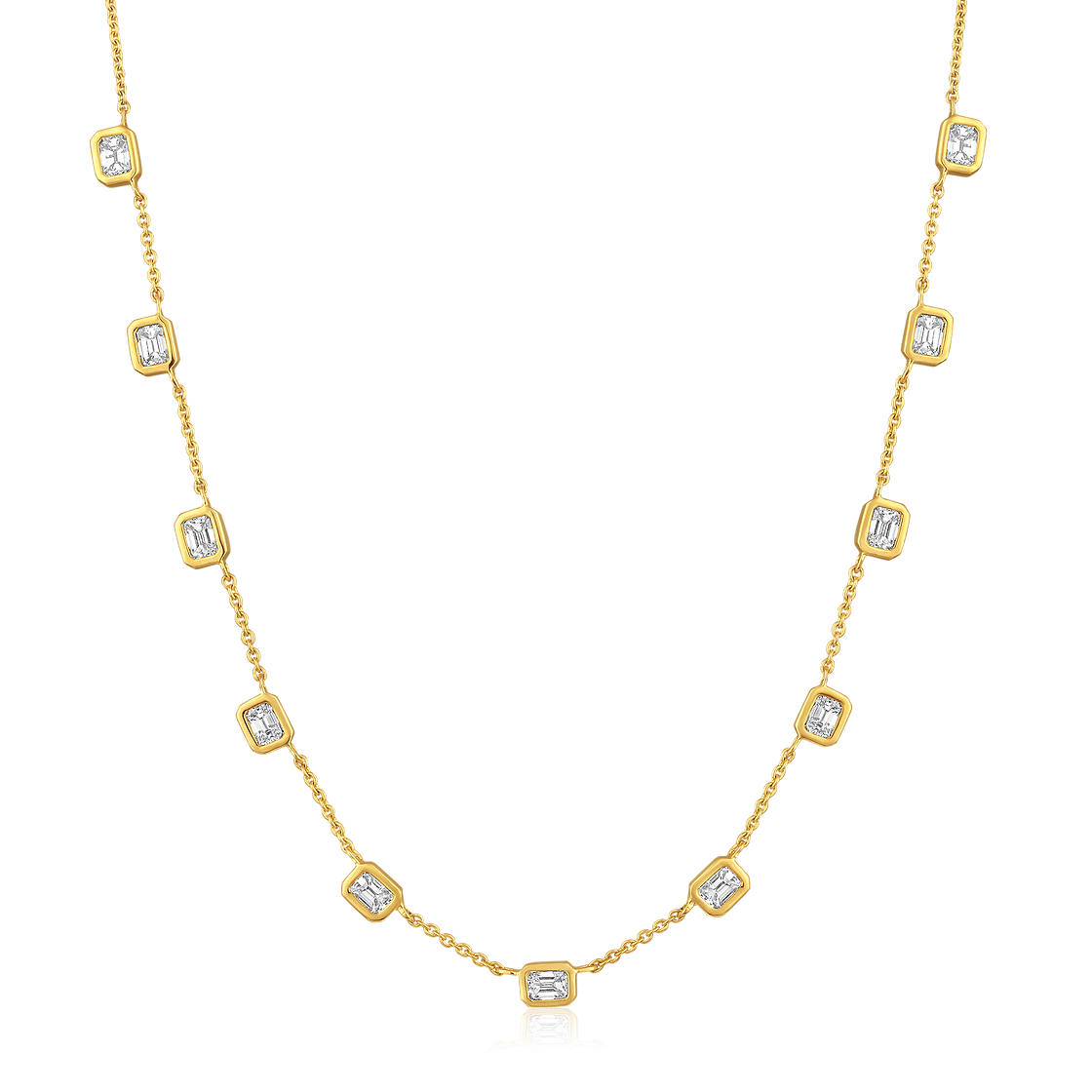 The Karat Concierge Sloane Bezel Bet emerald cut diamond necklace in 14K yellow gold with bezel set stones.