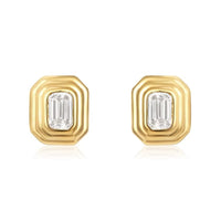 The Karat Concierge Gatsby emerald cut diamond stud earrings in 14K yellow gold with a faceted bezel setting.